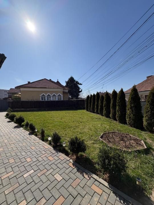 Oportunitate rară în Gheorgheni Casă renovată, teren cu front la două străzi – fotografia 3 din 12