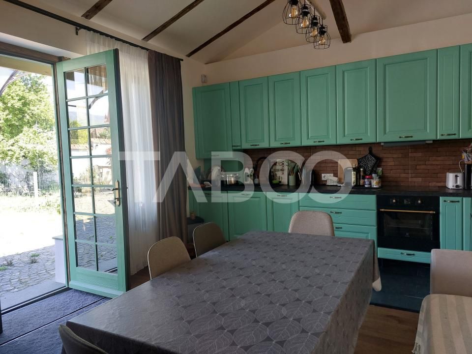 Casa de inchiriat 90 mp 3 camere curte 370 mp aproape de mall Cisnadie – fotografia 14 din 17