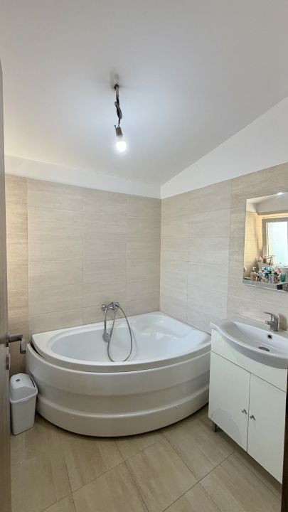 Casa de vânzare în Tunari – 3 dormitoare, curte proprie și 2 locuri de parcare – fotografia 16 din 18
