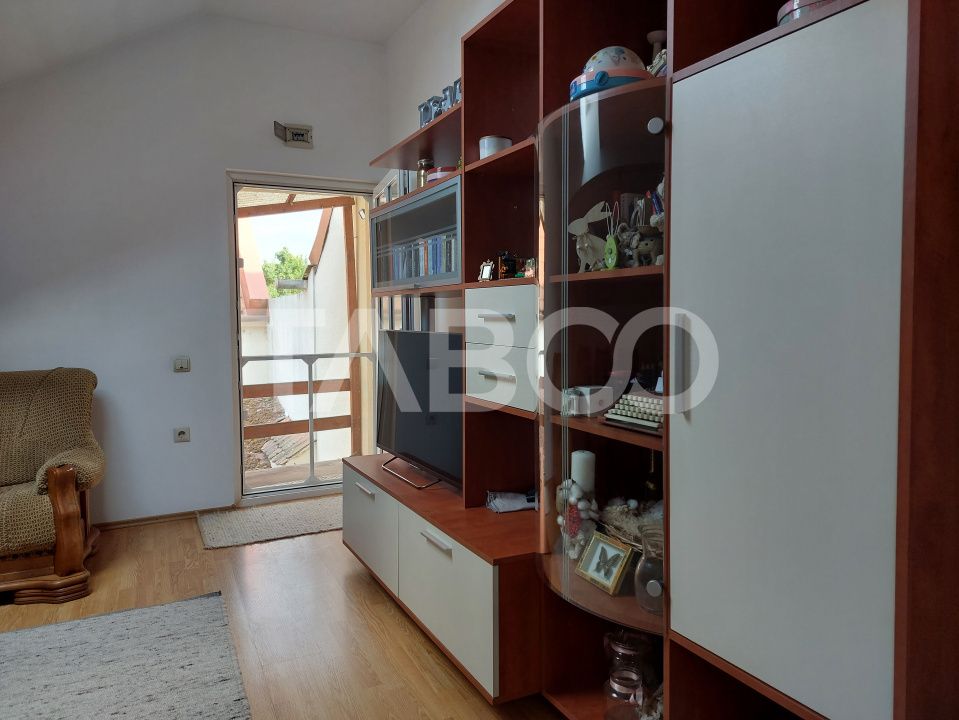 Casa 109 mp 4 camere pivnita terasa loc parcare curte comuna Cisnadie – fotografia 15 din 24