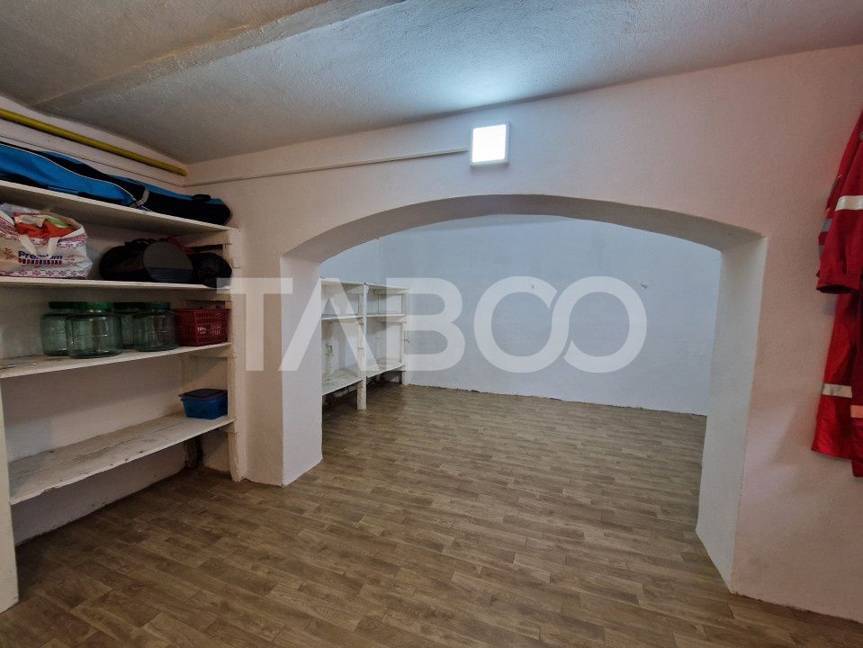 Apartament central 4 camere spatiu comercial garaj si pivnita Sibiu – fotografia 11 din 16