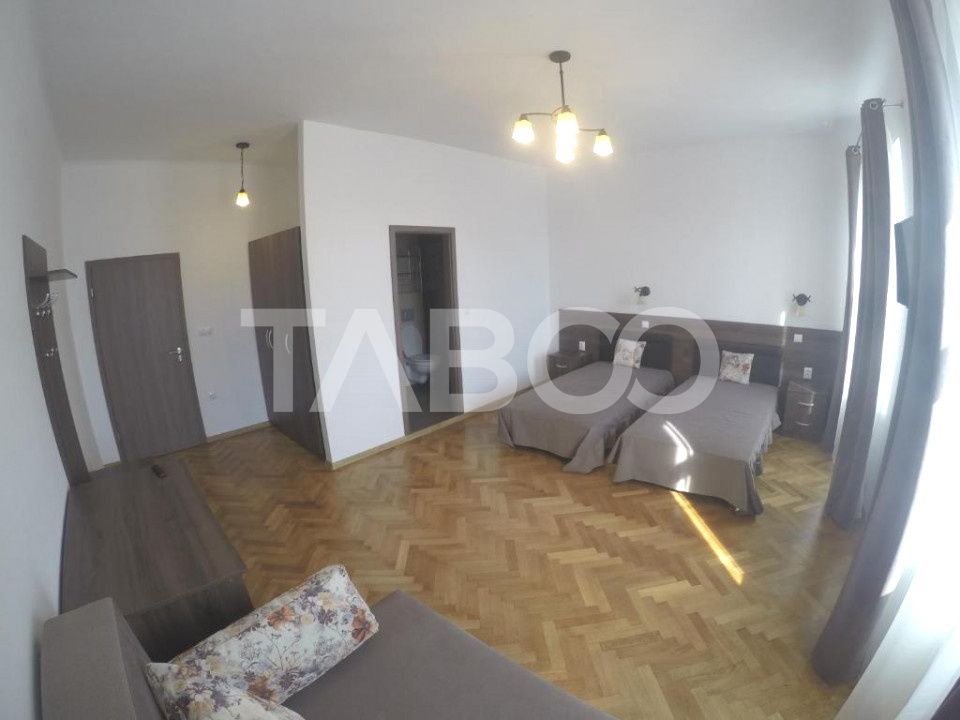 4 garsoniere pregatite pentru regim hotelier in Centrul Istoric Sibiu – fotografia 13 din 31
