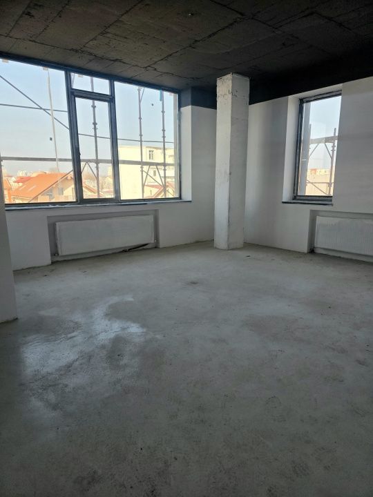 Clădire modernă cu regim D+P+3, situată în zona Faleza Nord – fotografia 35 din 43