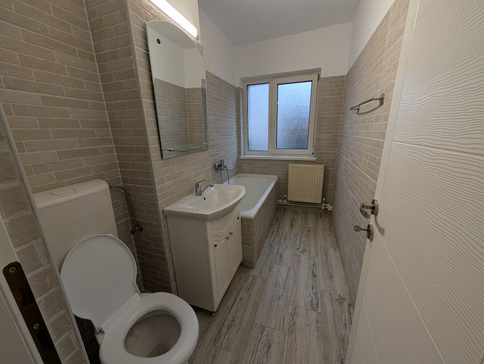 Apartament elegant de închiriat, zona centrala, etaj 2 – fotografia 4 din 5