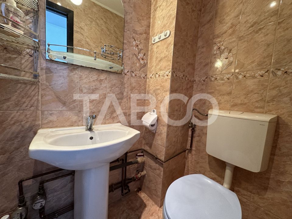 Apartament decomandat 3 camere 2 bai 68 mpu etaj 3 Calimanesti Valcea – fotografia 7 din 12