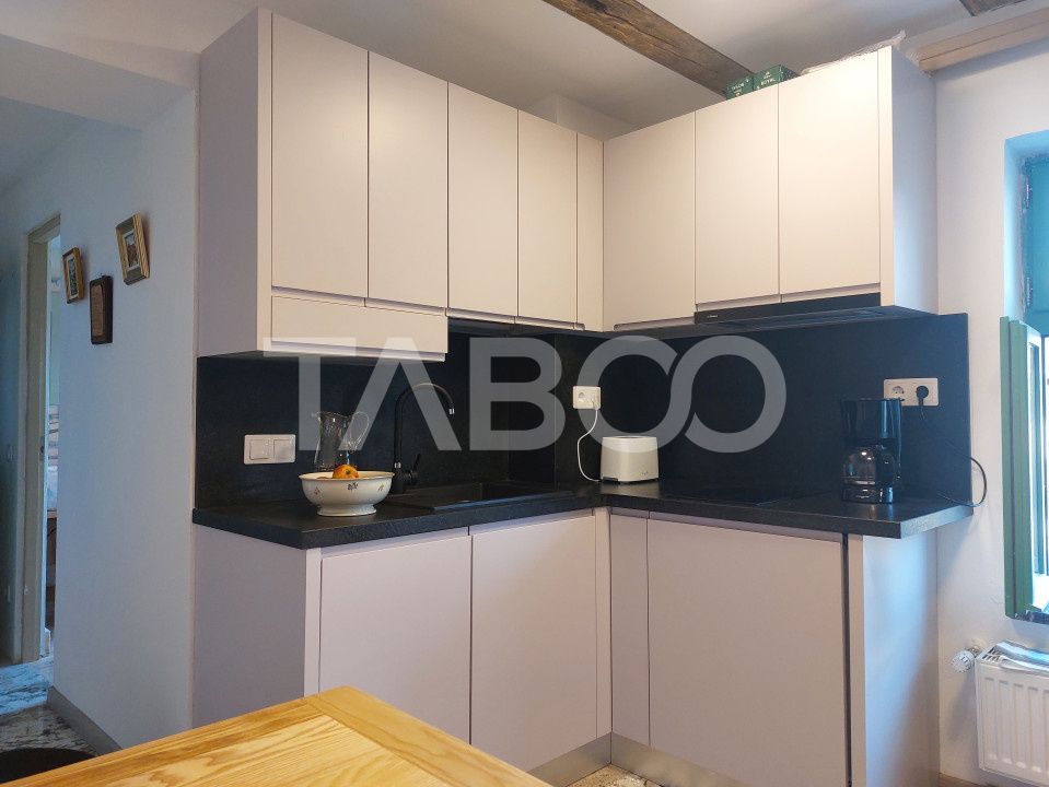 Apartament de vanzare 105 mp 3 camere curte 340 mp in acte Cisnadie – fotografia 7 din 27