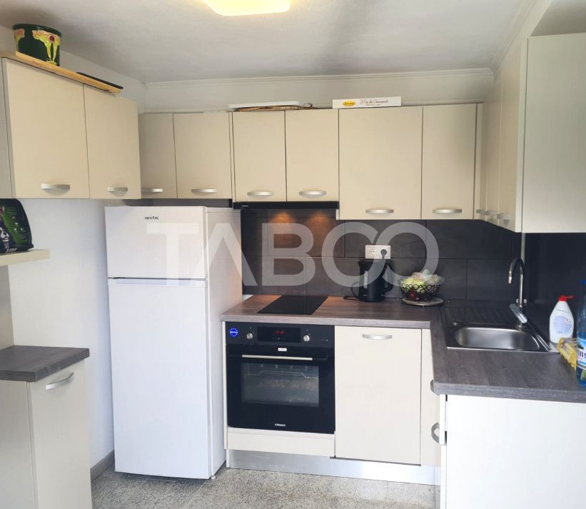 Casa de vanzare 3 camere 2 bucatarii 3 bai teren 340 mp Cisnadie – fotografia 9 din 36