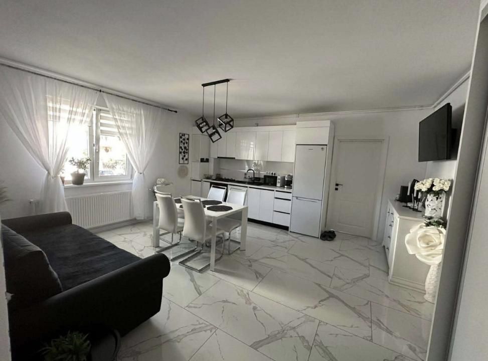 Apartament cu 3 camere , terasa 20 mp,parcare subterana,strada Eroilor – fotografia 2 din 7