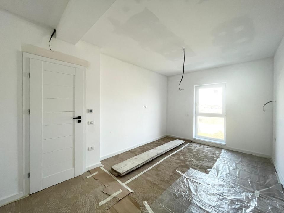 Duplex cu 5 camere separat prin camera tehnica - Mosnita Noua – fotografia 9 din 14