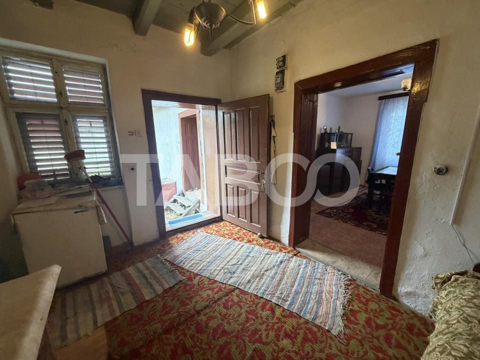 Casa de vacanta 3 camere anexa 720 m teren in Jibert Judetul Brasov – fotografia 5 din 9