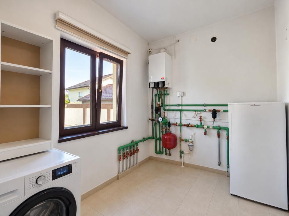 Proprietate exclusivistă cu piscină, garaj și teren de 900 mp – fotografia 23 din 24
