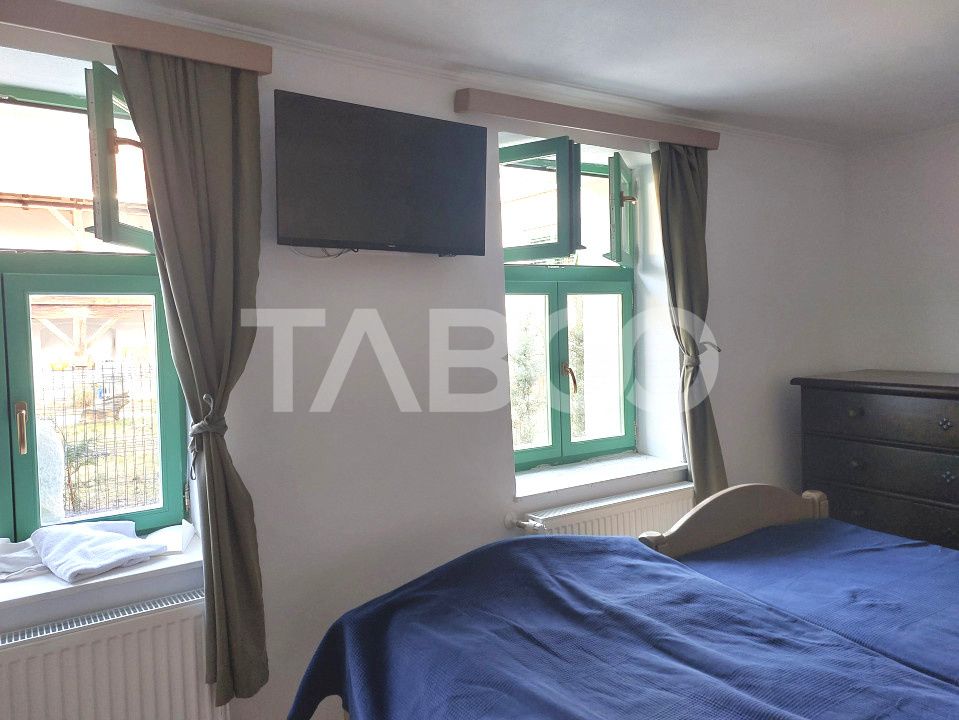 Apartament de vanzare 105 mp 3 camere curte 340 mp in acte Cisnadie – fotografia 9 din 27