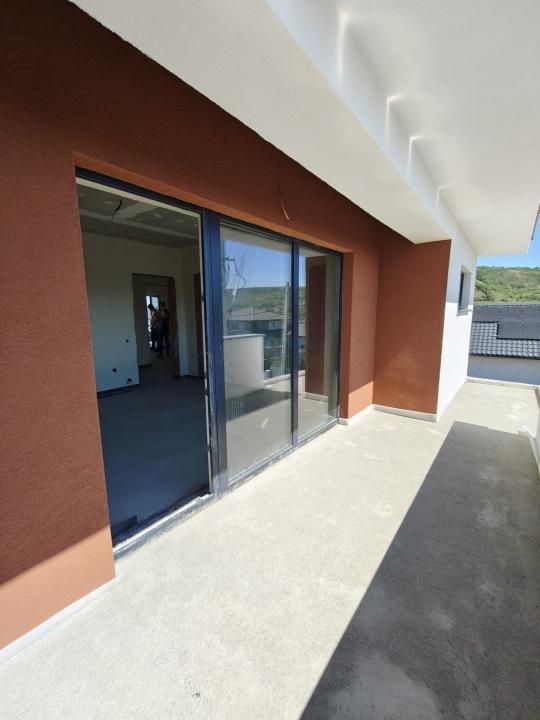 Casă individuală, 150 mp utili, teren 700 mp și garaj | Chinteni – fotografia 4 din 17