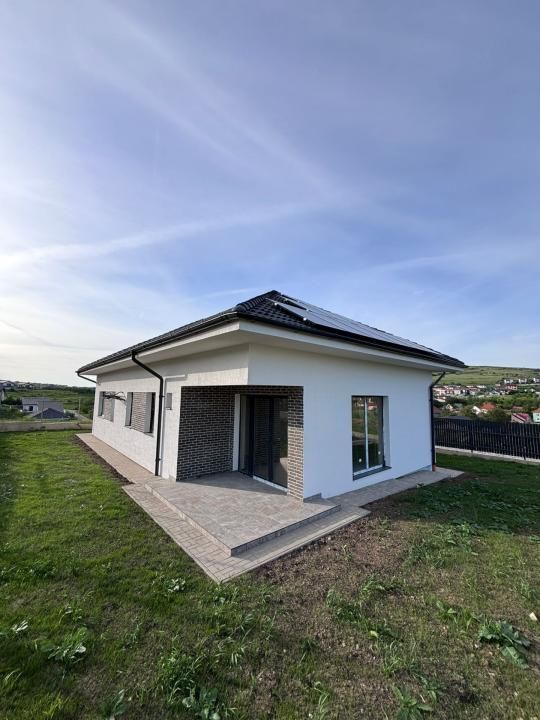 Casă individuală, P+Pod, panouri fotovoltaice, teren 500mp | Chinteni – fotografia 1 din 9
