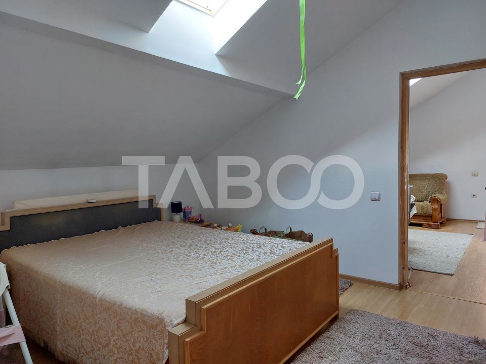 Casa 109 mp 4 camere pivnita terasa loc parcare curte comuna Cisnadie – fotografia 4 din 24