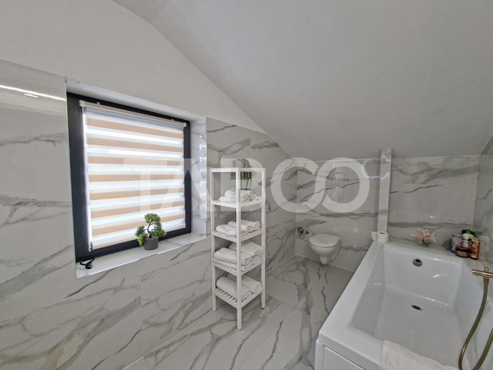 Casa de locuit + spatiu comercial de vanzare in Cisnadie – fotografia 11 din 23