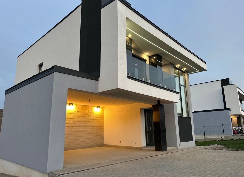 Proprietate moderna cu design exterior deosebit in Popesti – fotografia 7 din 21