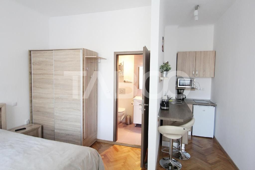 4 garsoniere pregatite pentru regim hotelier in Centrul Istoric Sibiu – fotografia 26 din 31