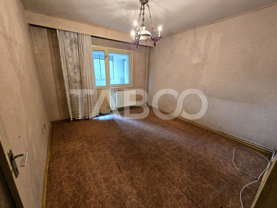 Apartament decomandat 4 camere 4 balcoane 2 bai etaj 1 Central Sibiu – fotografia 1 din 22