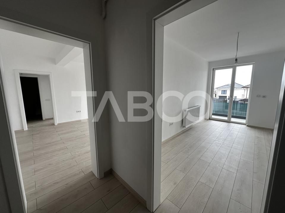 Apartament decoamandat 71 mpu 2 camere dressing balcon etaj 1 Selimbar – fotografia 5 din 7