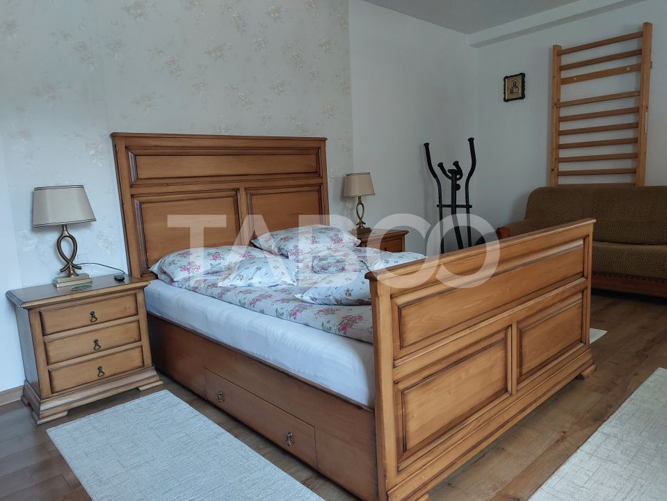 Casa 109 mp 4 camere pivnita terasa loc parcare curte comuna Cisnadie – fotografia 18 din 24