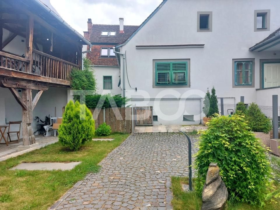 Casa cu 6 apartamente individuale gradina 253 mp langa mall Cisnadie – fotografia 1 din 39