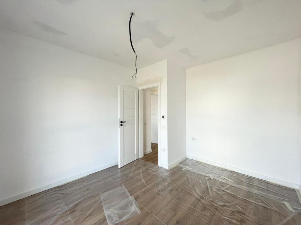 Duplex cu 5 camere separat prin camera tehnica - Mosnita Noua – fotografia 10 din 14
