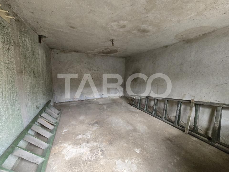 Casa de vanzare cu teren 412 mp pivnita garaj in Terezian Sibiu – fotografia 11 din 34