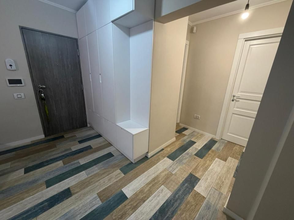 Apartament 3 camere complet renovat, garaj + parcare, aproape de centru – fotografia 5 din 11