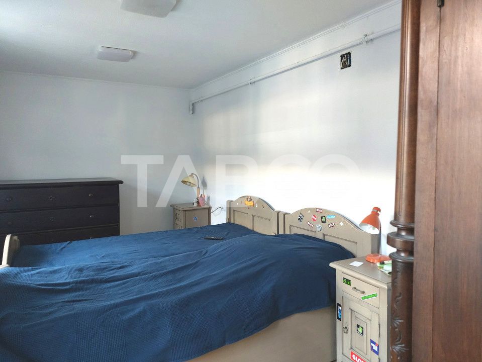 Casa de vanzare 3 camere 2 bucatarii 3 bai teren 340 mp Cisnadie – fotografia 6 din 36