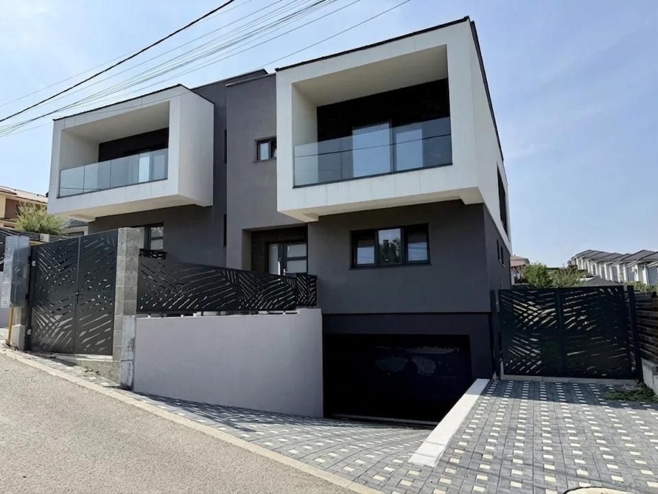 Casă alipită modernă, D+P+E, 185 mp utili și garaj | Dezmir – fotografia 1 din 4