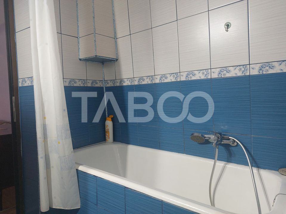 Casa in zona centrala 5 camere 2 bucatarii 3 bai curte comuna Cisnadie – fotografia 21 din 28