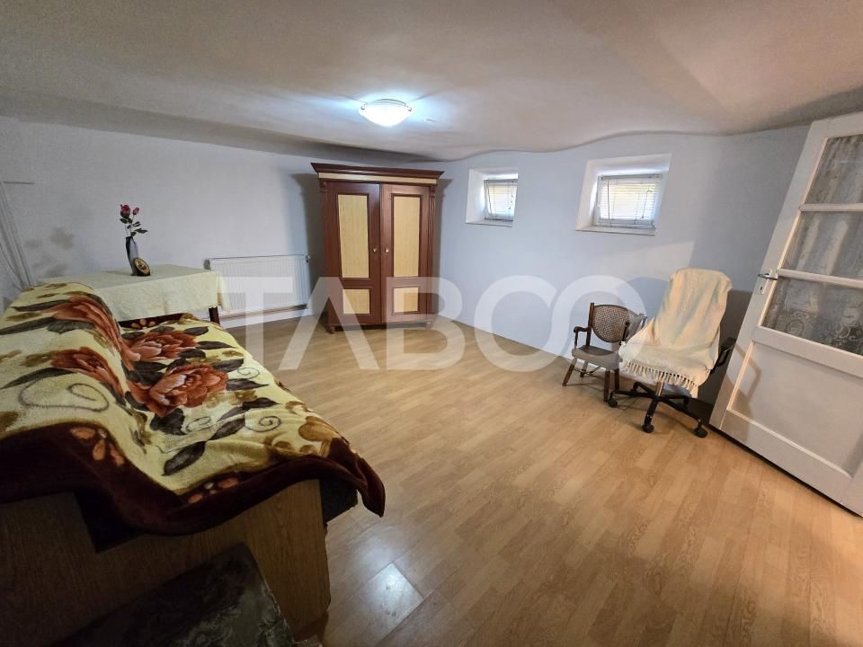 Casa individuala de vanzare cu teren 237 mp garaj in zona Lupeni Sibiu – fotografia 6 din 32