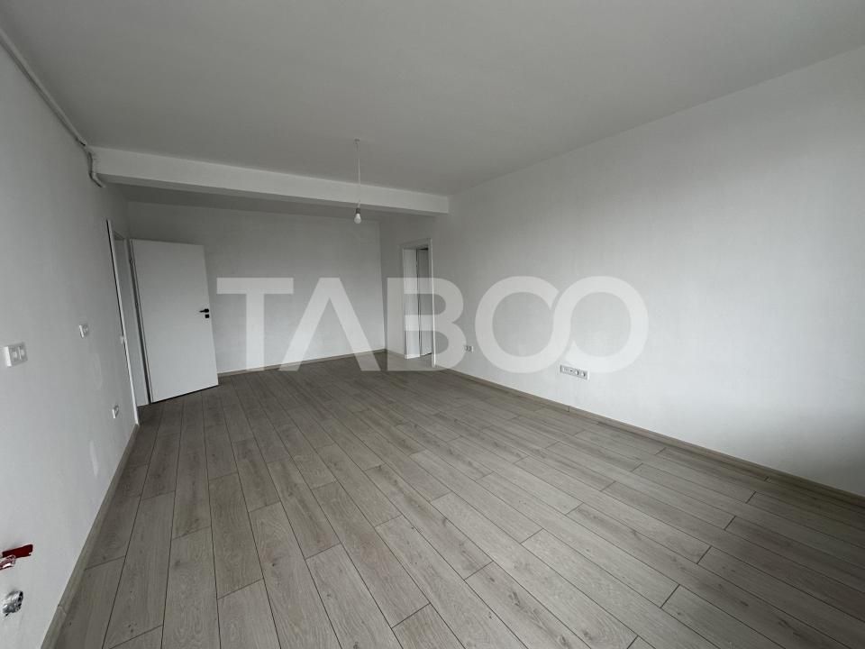 Apartament decoamandat 71 mpu 2 camere dressing balcon etaj 1 Selimbar – fotografia 1 din 7