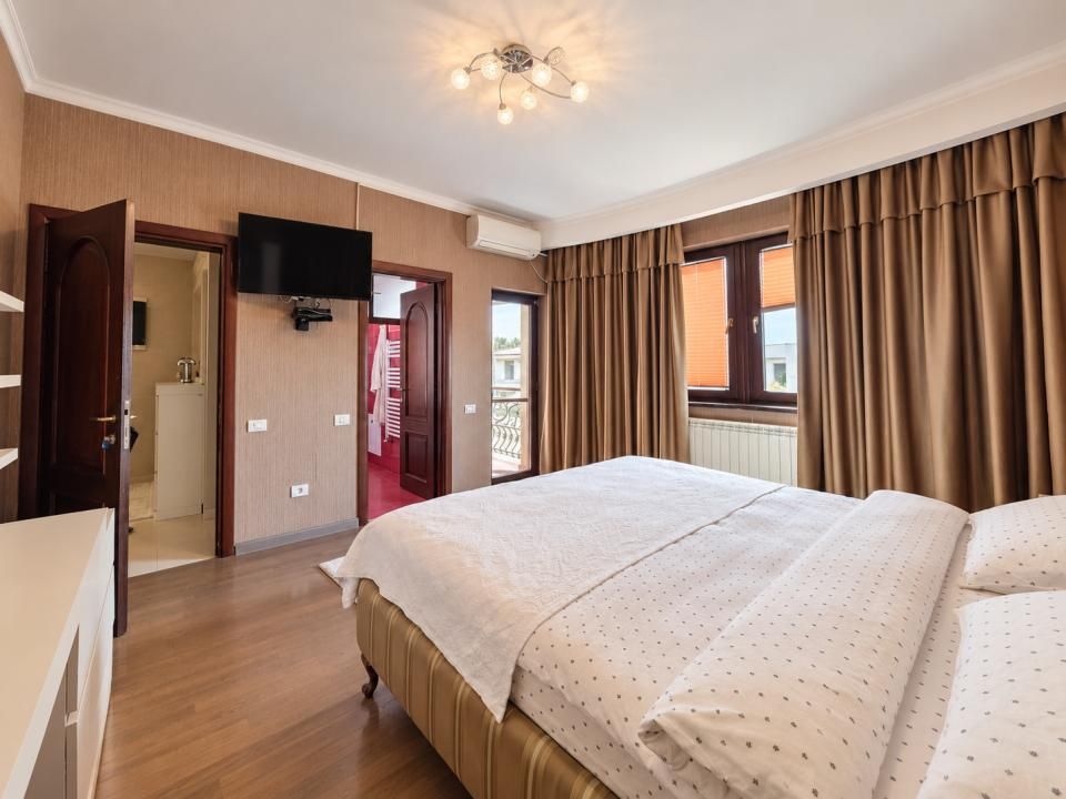 Proprietate exclusivistă cu piscină, garaj și teren de 900 mp – fotografia 10 din 24