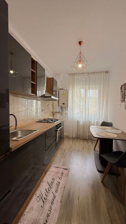 Apartament 2 camere, decomandat, parcare, balcon, mobilat și utilat–Florești – fotografia 6 din 10
