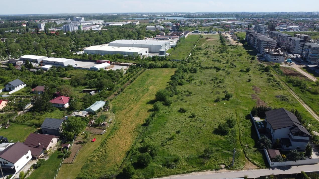 Oportunitate de Investiție: Teren Intravilan 15.866 mp PUZ P+4+M și Dublu Acces – fotografia 4 din 11