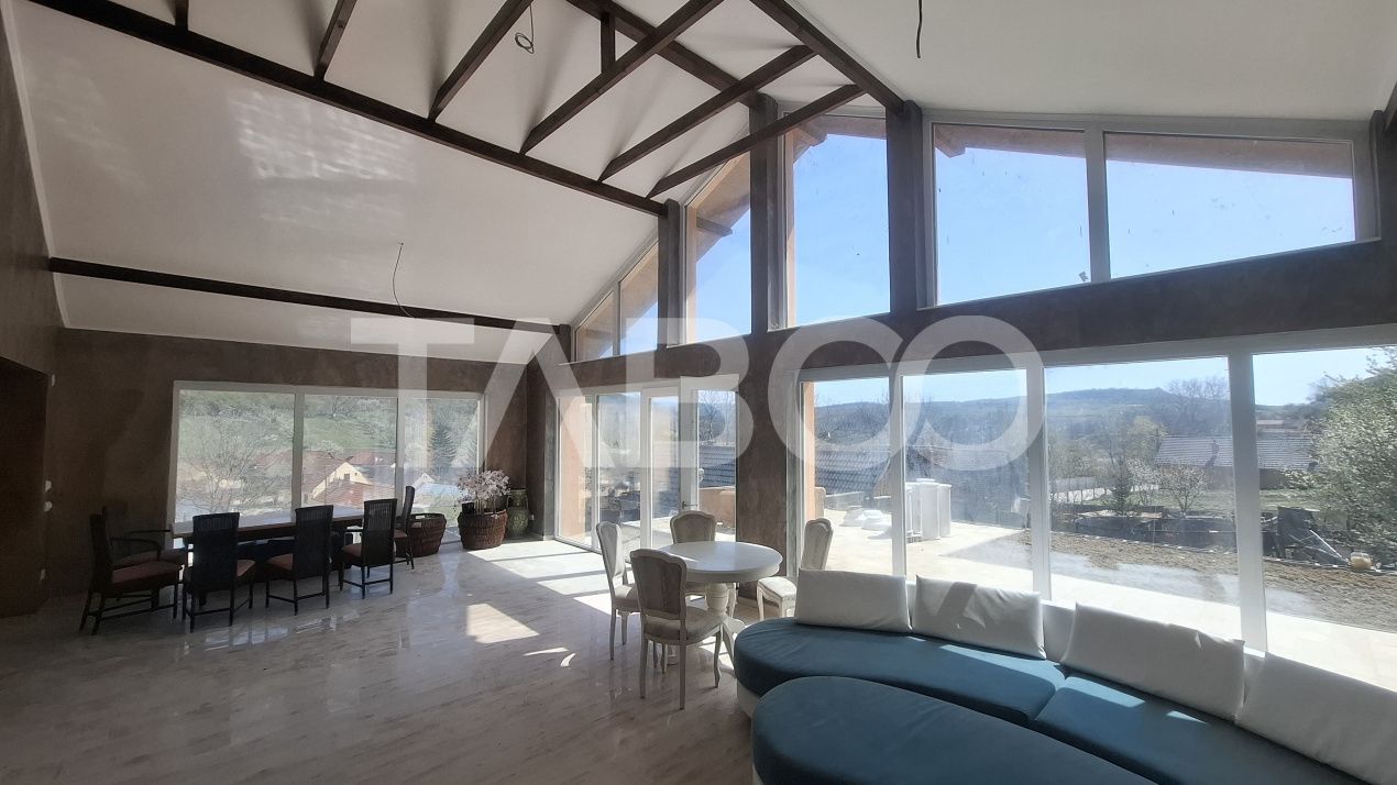 Casa de vanzare 405 mp utili 2 garaje 250 mp terase Slimnic Sibiu – fotografia 1 din 19