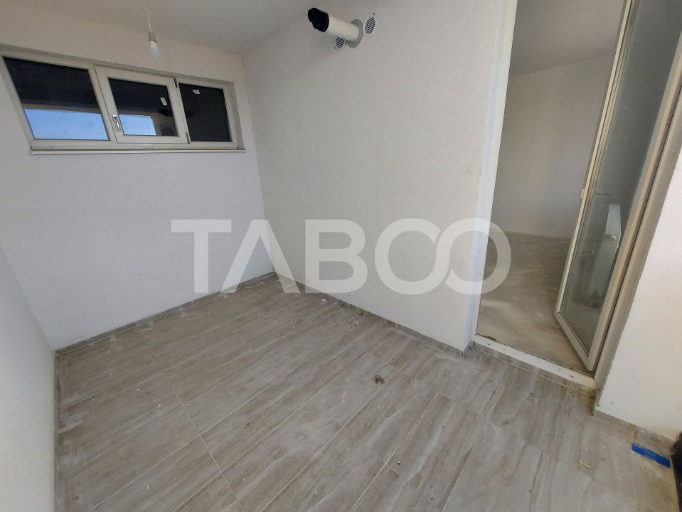 Apartament decomandat de vanzare 52 mpu 2 camere 2 logii loc parcare – fotografia 4 din 5