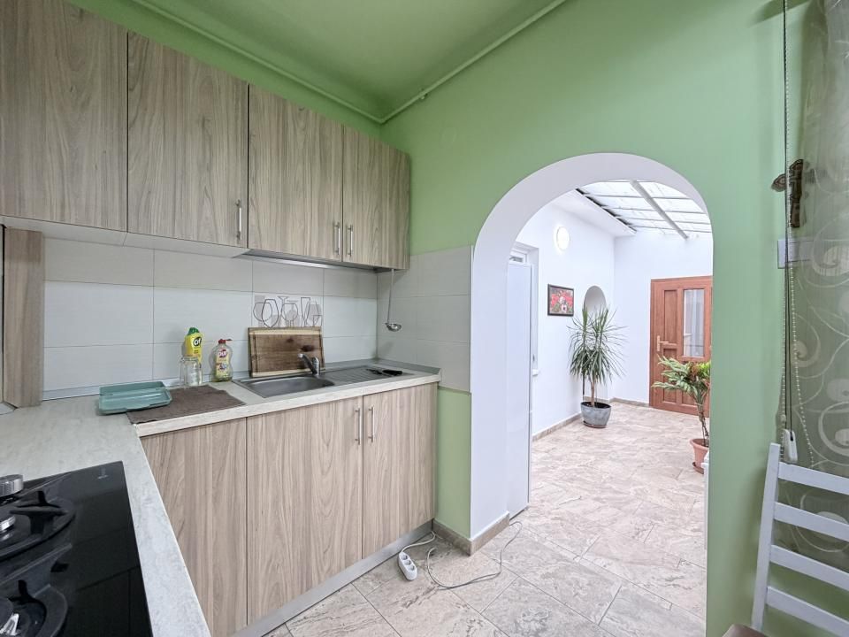 Garsoniera la casa - parter - 40 mp - Zona Stefan Cel Mare-Vasile Aron – fotografia 13 din 16