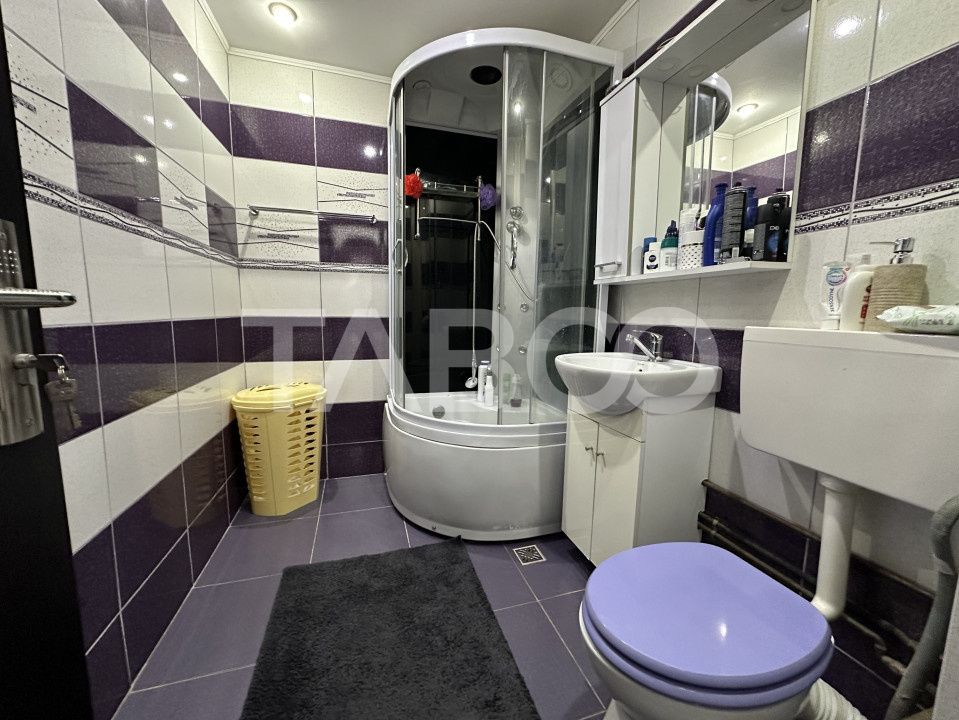 Apartament decomandat 3 camere 2 bai 68 mpu etaj 3 Calimanesti Valcea – fotografia 6 din 12