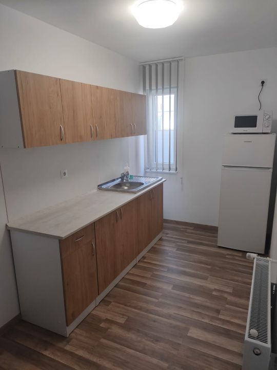 Clădire multifuncțională de vânzare – 24 locuinte, curte, randament ridicat – fotografia 12 din 28