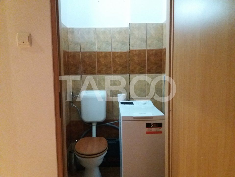 Apartament decomandat 3 camere  2 bai etaj 3 balcon zona buna Cisnadie – fotografia 12 din 13