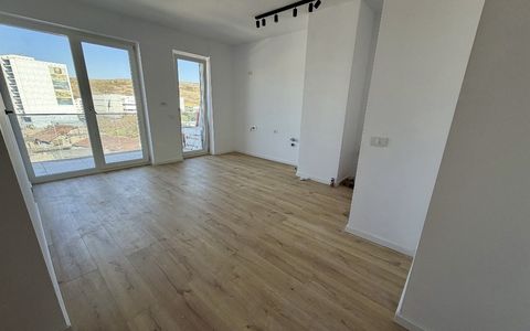 Apartament 2 camere finisat , etaj intermediar  , zona Elite Junior