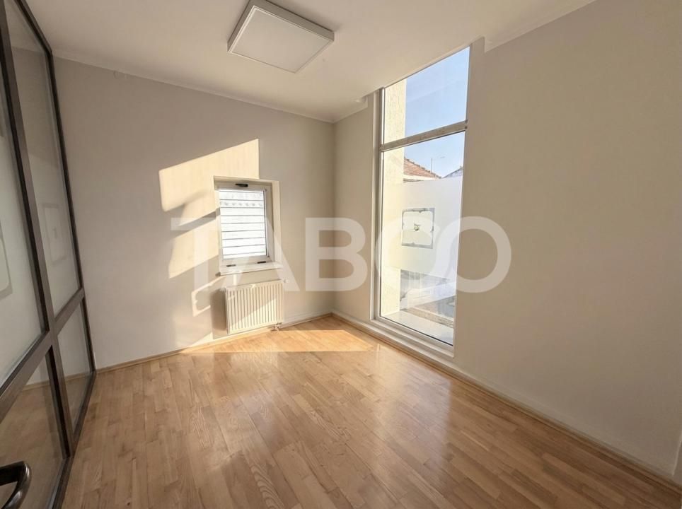 Cladire de birouri cu spatiu comercial la parter si 6 locuri parcare – fotografia 8 din 13