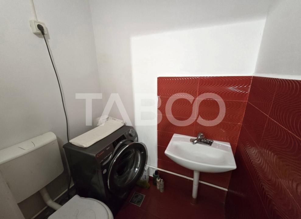 Apartament 3 camere decomandat 72 mpu 2 bai pivnita Vasile Aaron Sibiu – fotografia 7 din 12