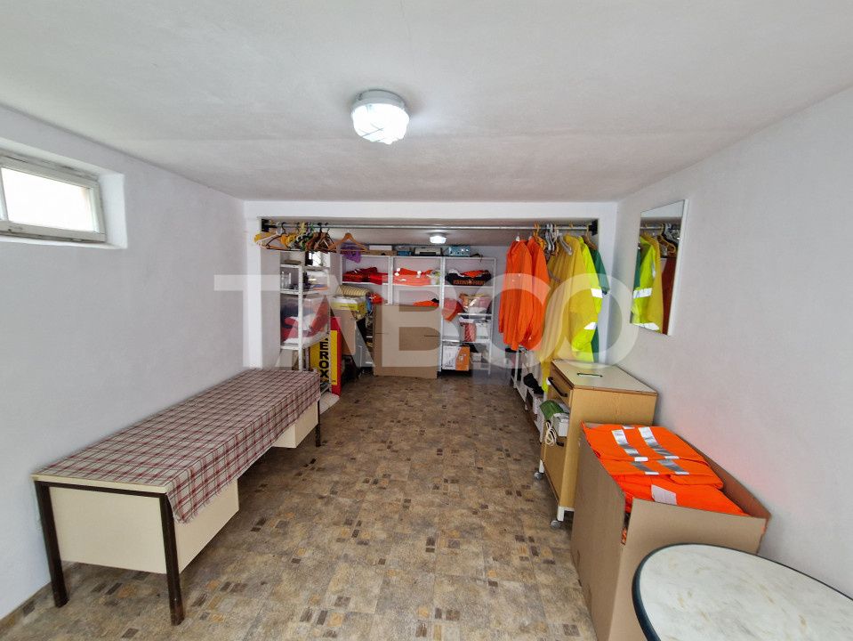 Apartament central 4 camere spatiu comercial garaj si pivnita Sibiu – fotografia 8 din 16