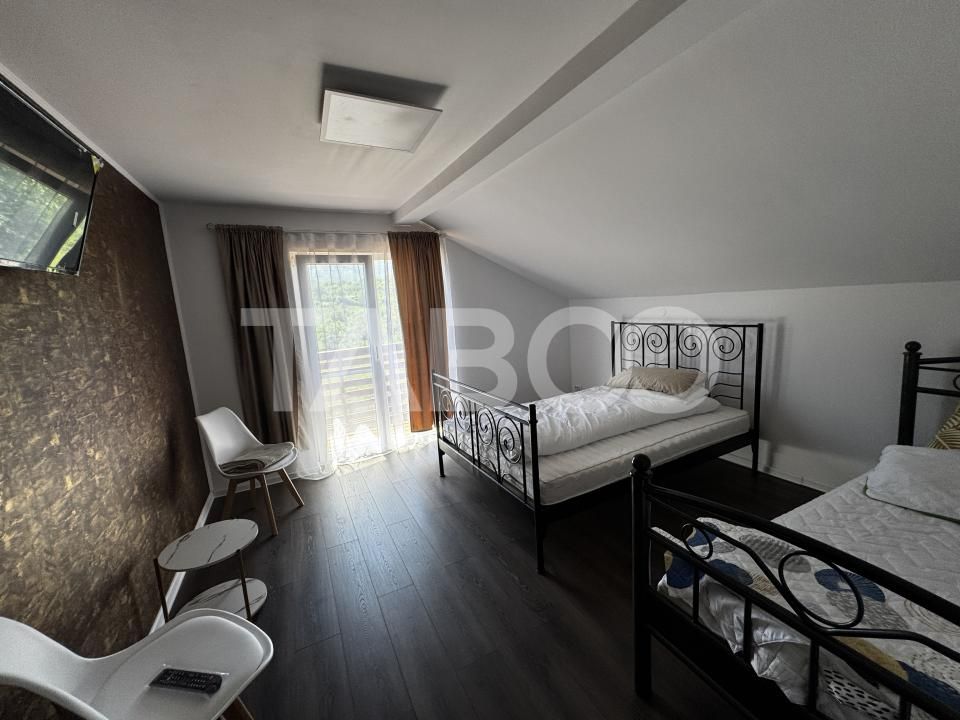 Oportunitate investitie - Pensiune renovata cu 8 camere langa Sibiu – fotografia 8 din 32