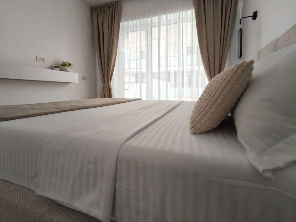 Apartament de închiriat - Zona Mamaia Nord cu 2 camere si vedere la piscina – fotografia 8 din 9