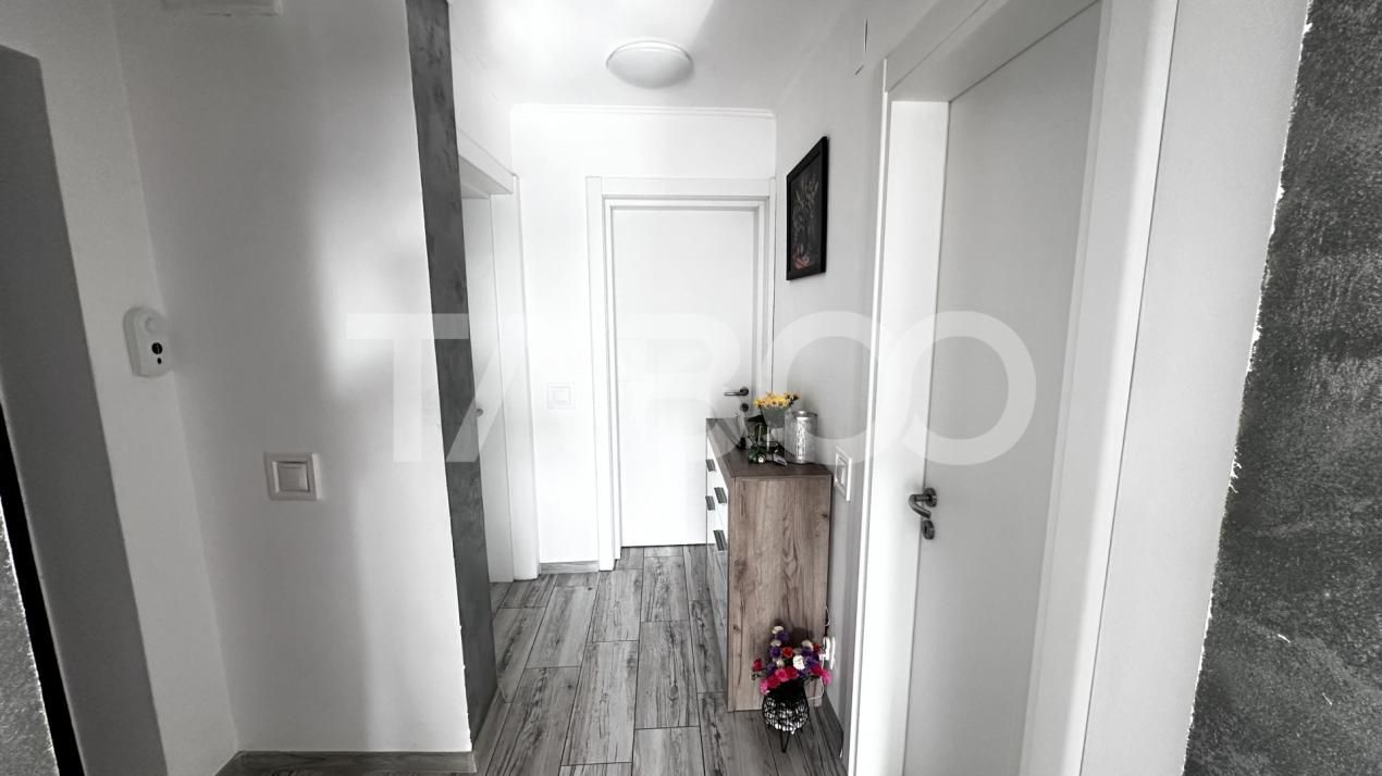 Apartament de vanzare 3 camere decomandate loc parcare Selimbar – fotografia 8 din 8
